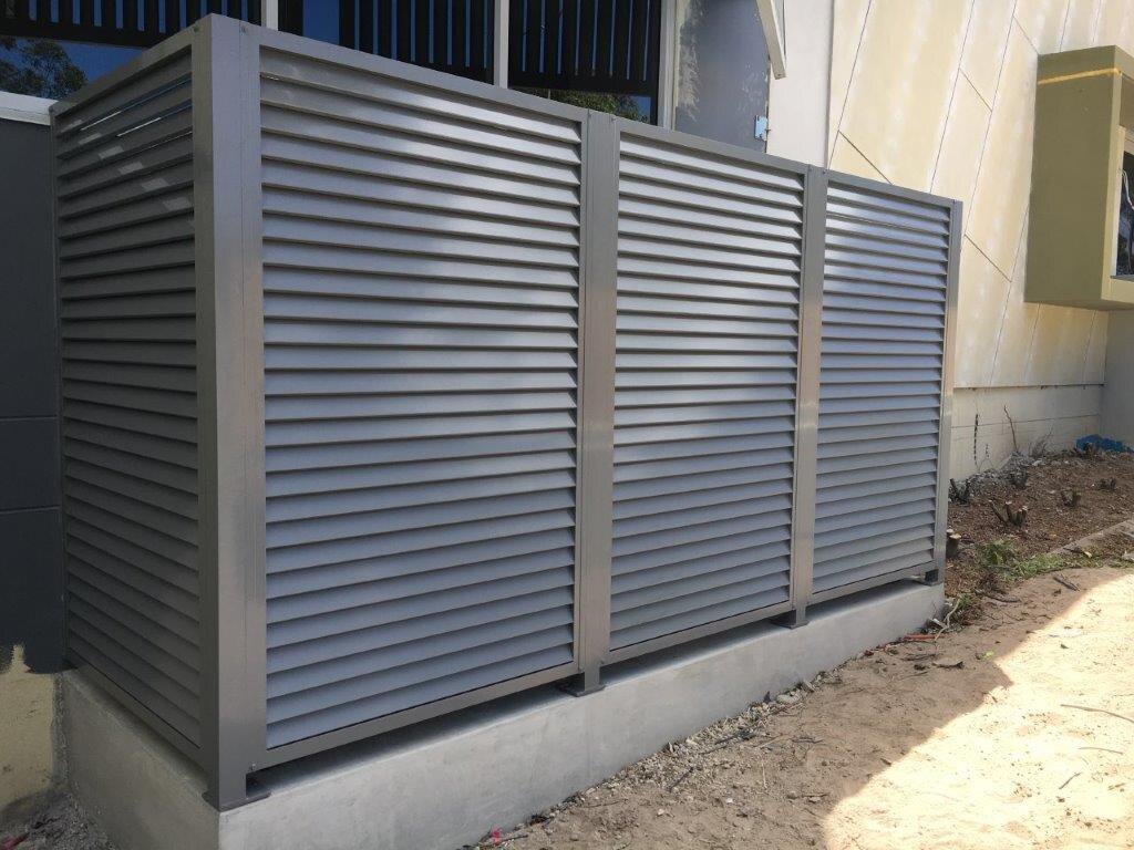 Aluminium louvre screens covering air conditioning plant